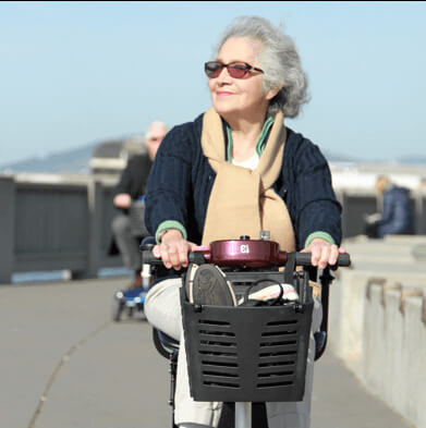 elderly with mobility scooter